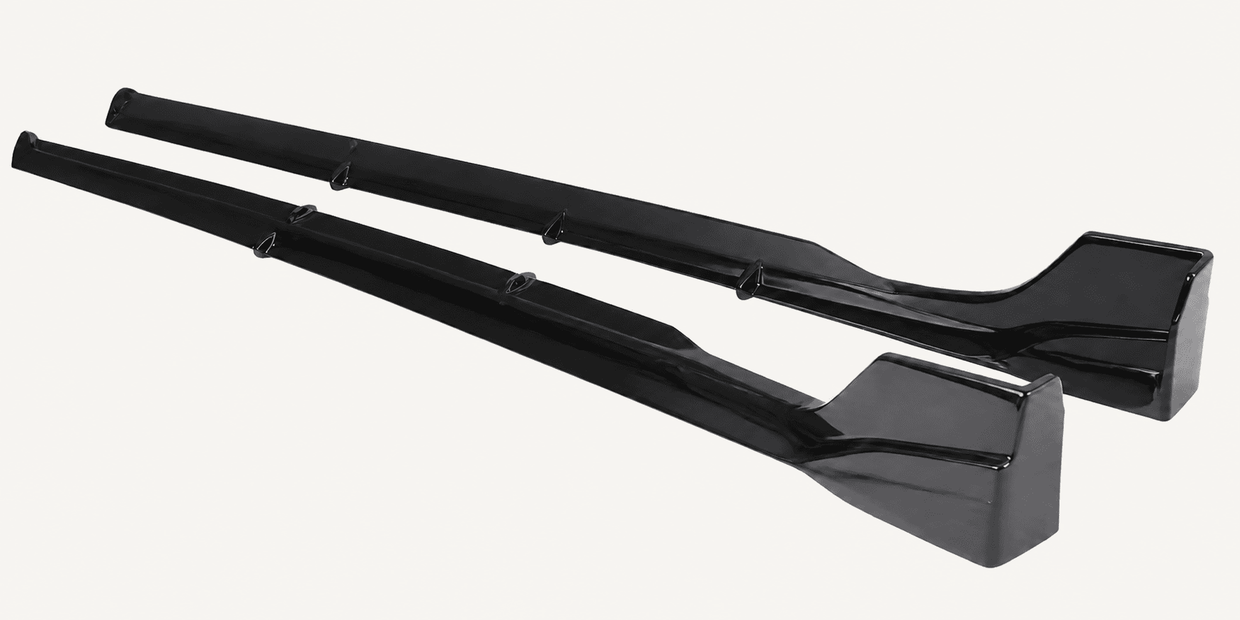 Pair of gloss black BYD SEAL side skirts shown as standalone parts